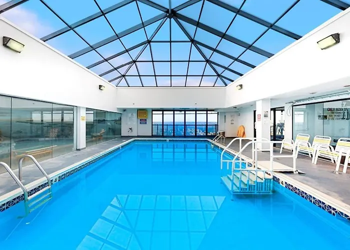 Holiday home Captivating Beachfront With Balcony Views Pools Gym & Tennis Court