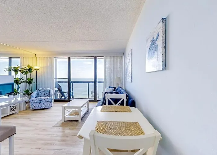 Holiday home Captivating Beachfront With Balcony Views Pools Gym & Tennis Court