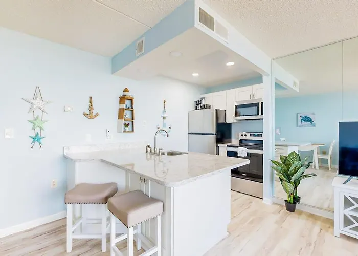 Captivating Beachfront With Balcony Views Pools Gym & Tennis Court