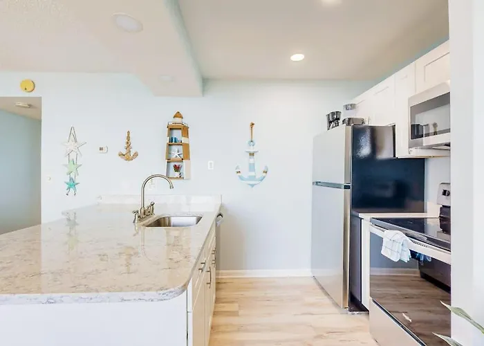 Captivating Beachfront With Balcony Views Pools Gym & Tennis Court