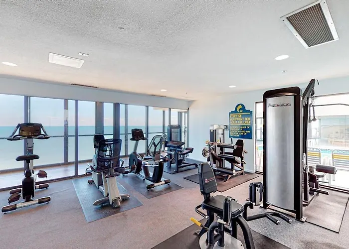 Holiday home Captivating Beachfront With Balcony Views Pools Gym & Tennis Court